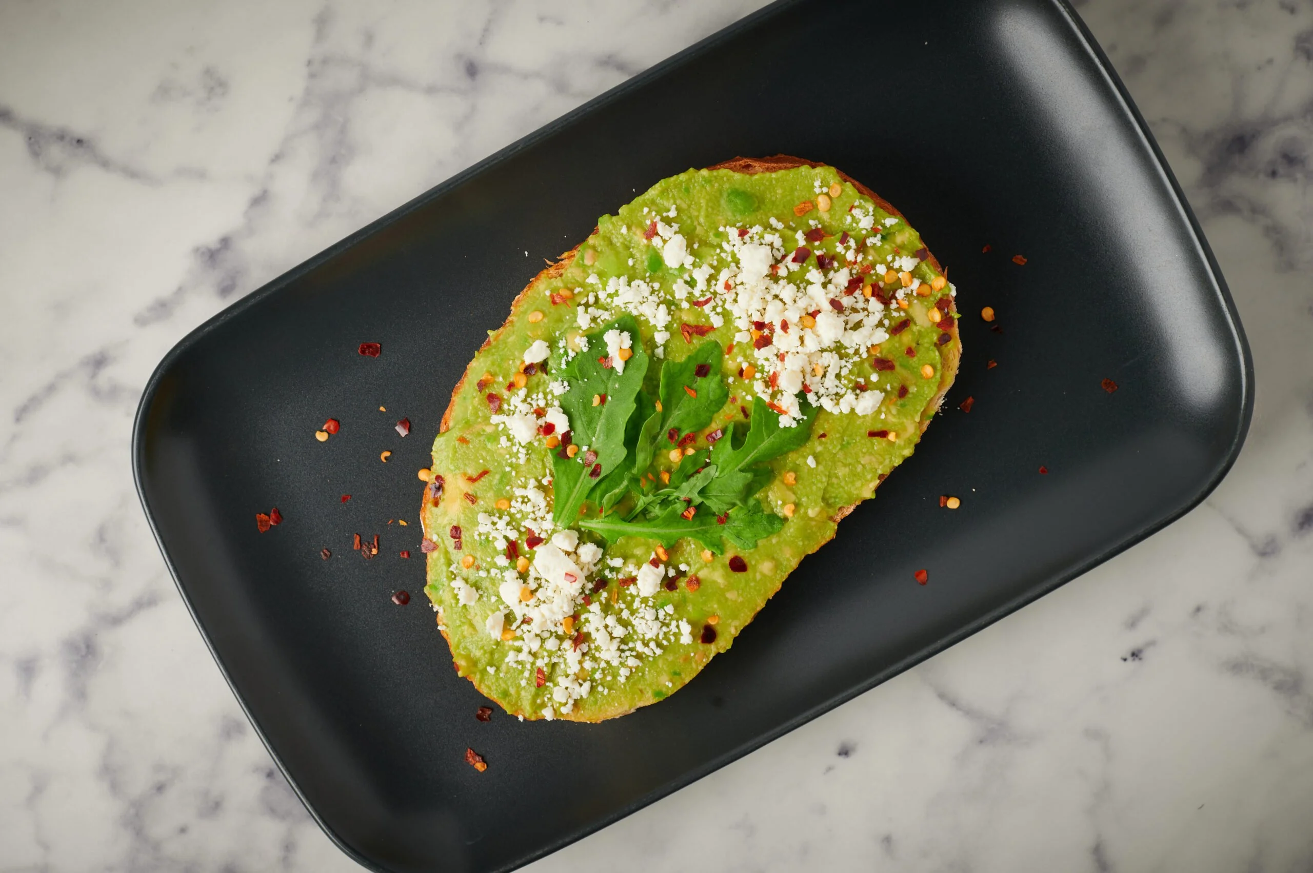Photograph of Avocado Toast captured in food photography.