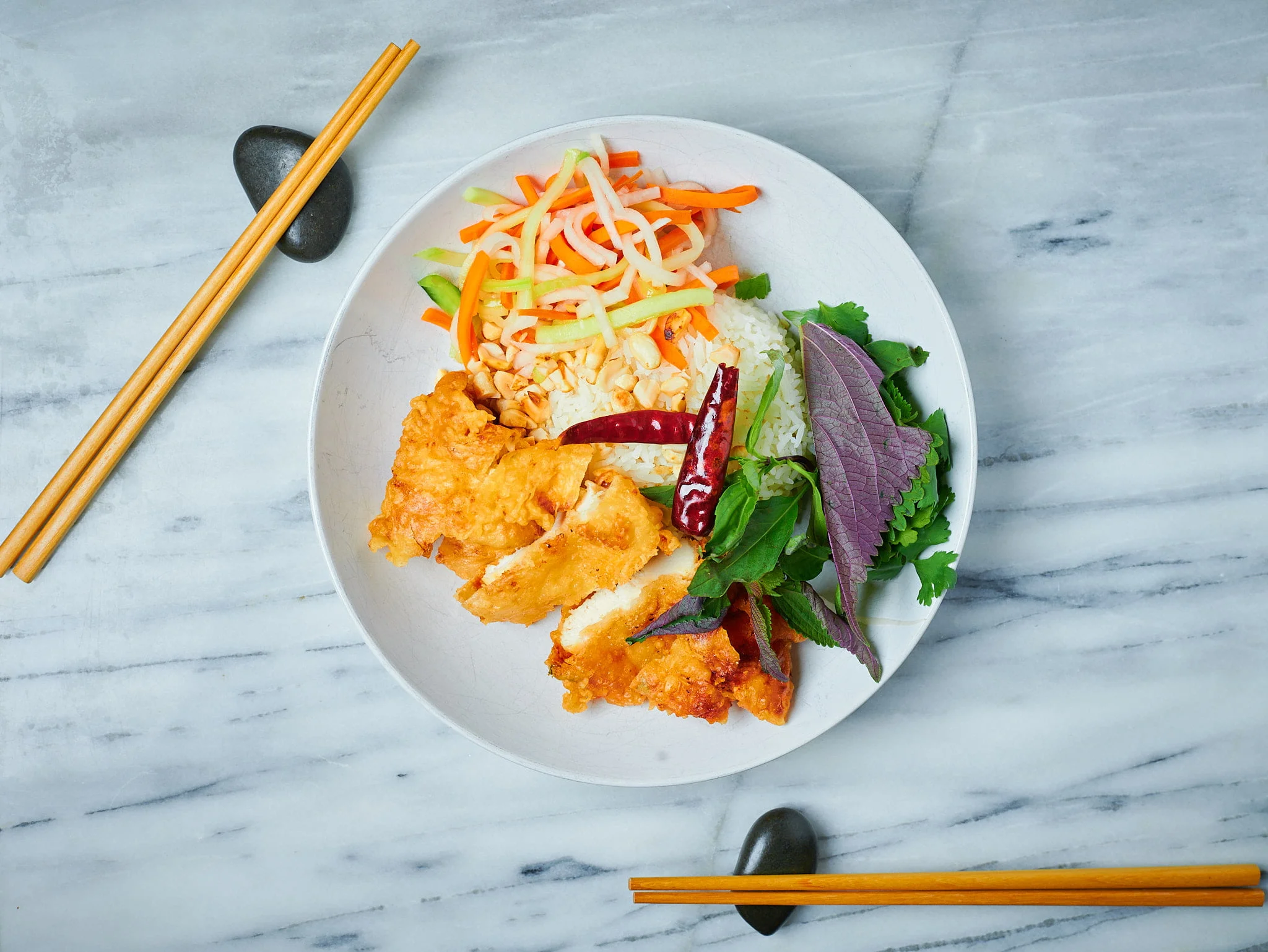 Photograph of a tempting Fried Chicken Rice Bowl, artfully captured in food photography