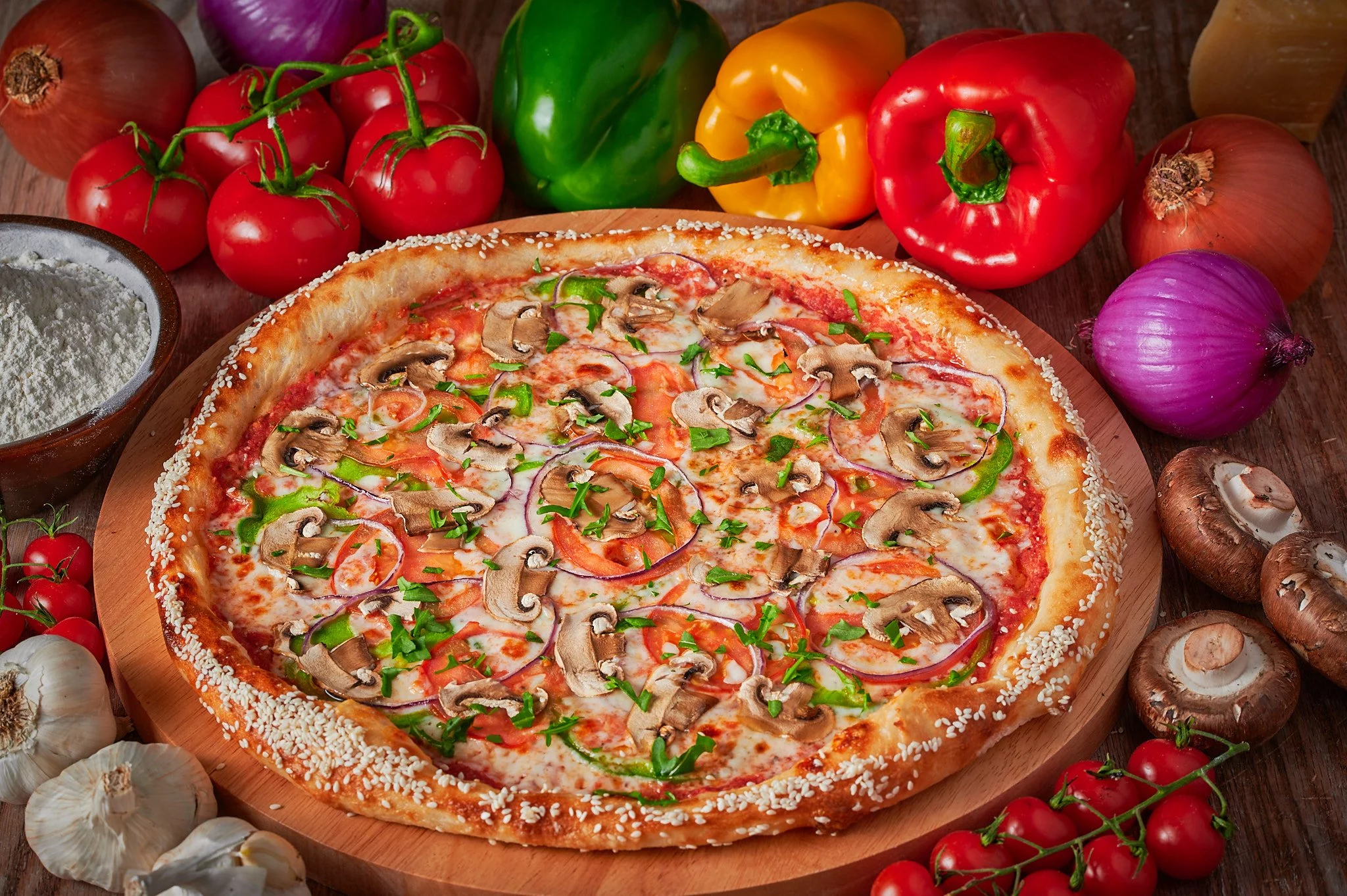 Photograph of a savory pizza adorned with an array of fresh vegetables and cheese, beautifully captured in food photography.